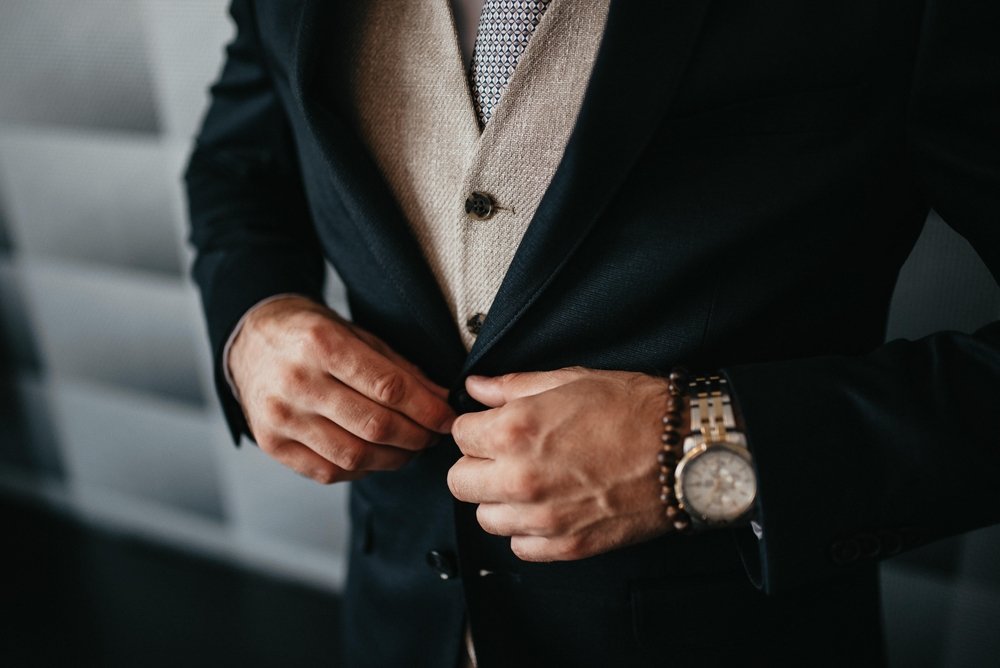 Young,Handsome,Man,In,Classic,Suit.,Young,Businessman,Puts,On